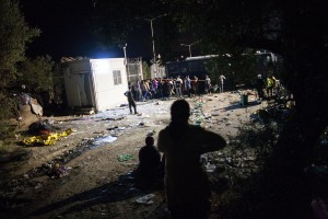 Refugee families queueing in the back of the riot police busses in Moria / copyright: Salinia Stroux